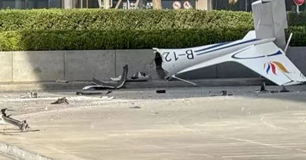 Impacto de una avioneta contra la Torre CITIC en Beijing